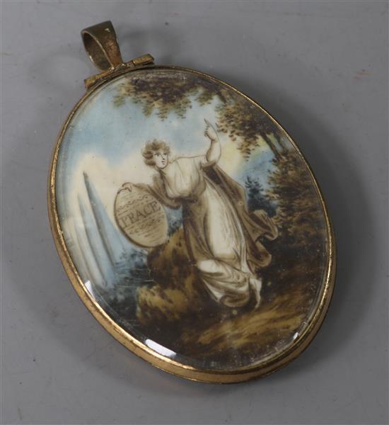 A 19th century gilt metal mounted oval painted mourning pendant locket, 51mm.